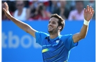 EASTBOURNE, ENGLAND - JUNE 21:  Feliciano Lopez of Spain celebrates after beating Richard Gasquet of France during their Men's Singles Finals match on day eight of the Aegon International at Devonshire Park on June 21, 2014 in Eastbourne, England. (Photo by Jan Kruger/Getty Images)